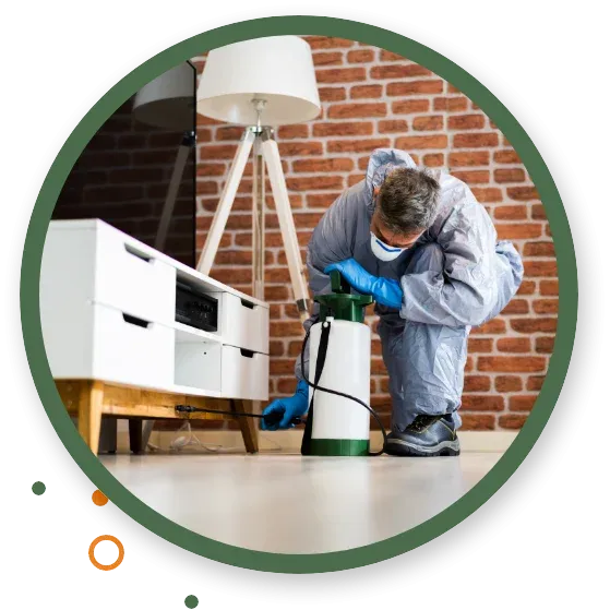 pest technician working in home