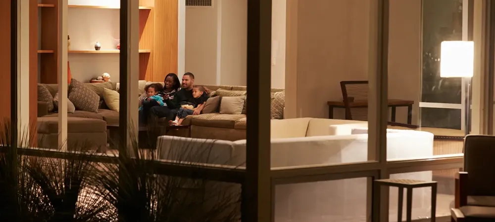 family on a couch in a pest free home