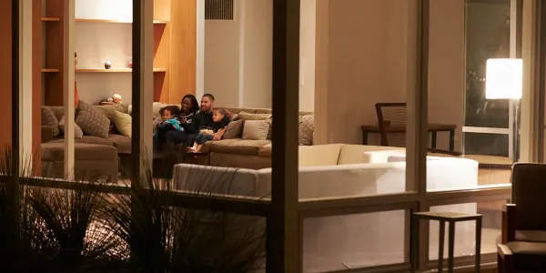 family on a couch in a pest free home